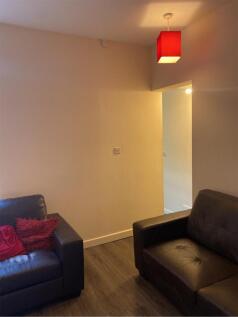 A cozy living room featuring comfortable seatin...