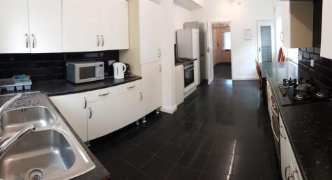 Modern kitchen with ample counter space, white ...