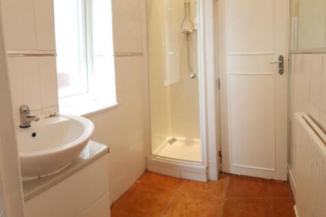 A clean and well-maintained bathroom featuring ...