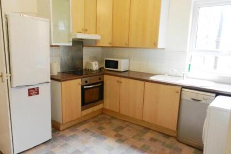 A bright and functional kitchen with ample coun...