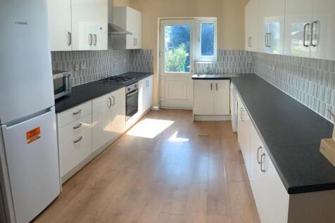 A bright andmodern kitchen with ample counterto...