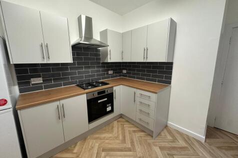 Modern and well-maintained kitchen featuring wh...