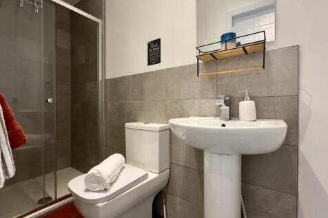 A modern and well-maintained bathroom with styl...