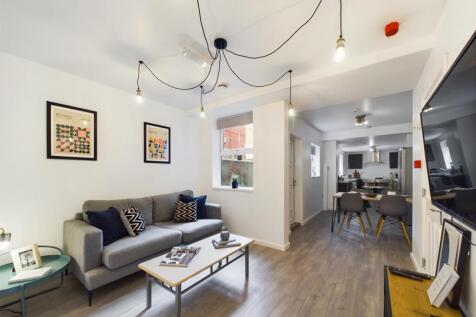 A stylish and spacious modern living room perfe...