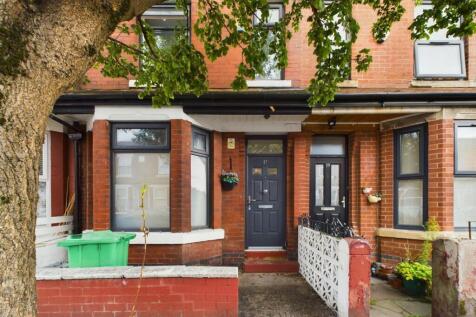 A charming and inviting exterior view of the pr...