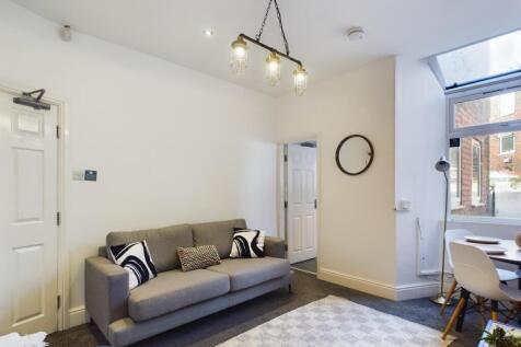 A bright and inviting living room perfect for s...