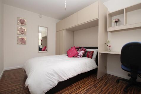 A spacious and well-maintained master bedroom f...