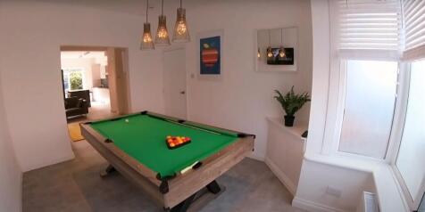 Bright and welcoming living room featuring natu...