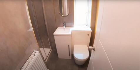 A clean and well-maintained bathroom featuring ...