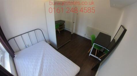 A small, neatly maintained bathroom with a simp...