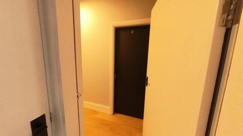 A clear exterior shot showcasing the front of a...