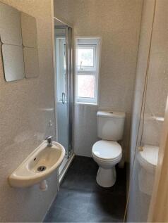 A clean and well-maintained bathroom featuring ...