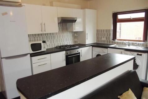 A well-maintained kitchen with clean surfaces, ...
