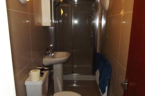 A clean and well-maintained bathroom with a toi...