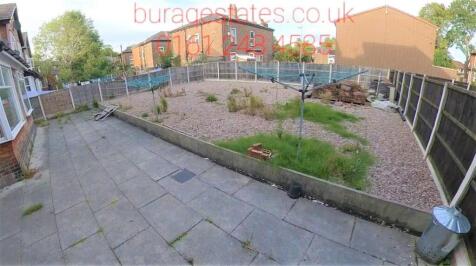 A spacious and well-maintained garden featuring...