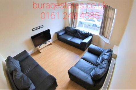 Bright and inviting living room featuring three...