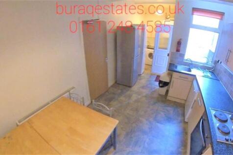 Bright and functional kitchen space featuring a...