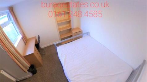 Bright and cozy single bedroom featuring a comf...