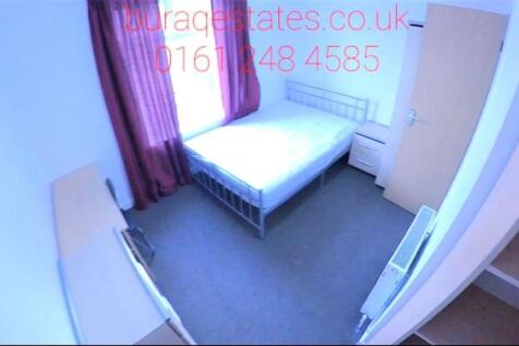 A neat and simple single bedroom featuring a be...