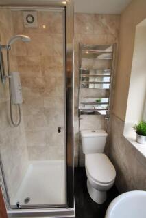 A modern, well-maintained bathroom featuring a ...