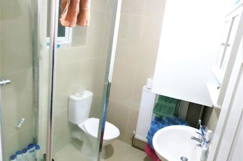 A clean and well-maintained bathroom featuring ...