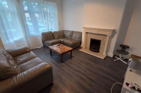 Bright, well-presented living room with large f...