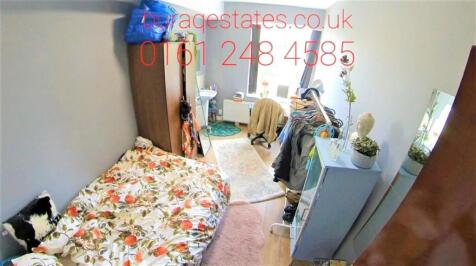 Cozy furnished bedroom with a floral single bed...