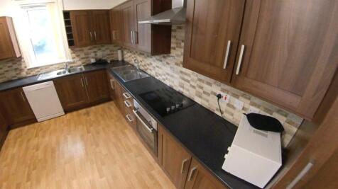 Bright, modern kitchen with plenty of storage, ...