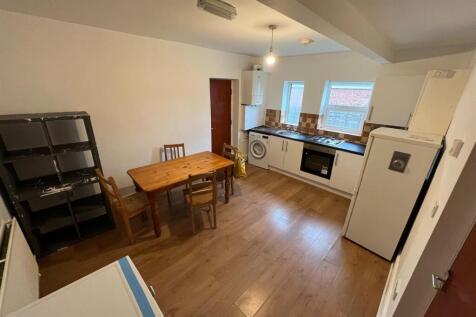 A bright and inviting living space with ample n...