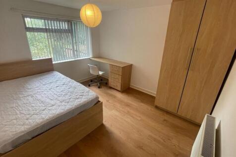 A spacious and well-maintained master bedroom f...