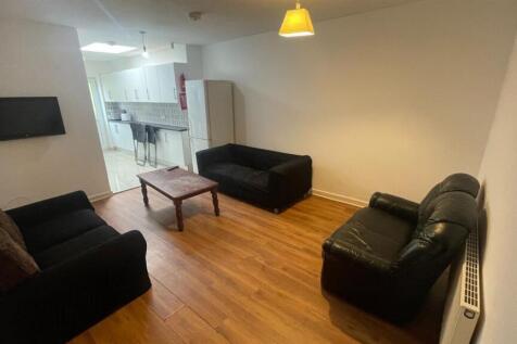 Bright and spacious living room with modern fur...