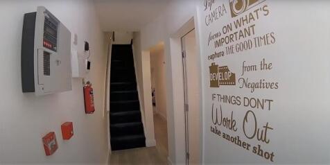 A spacious and well-maintained bathroom suite w...