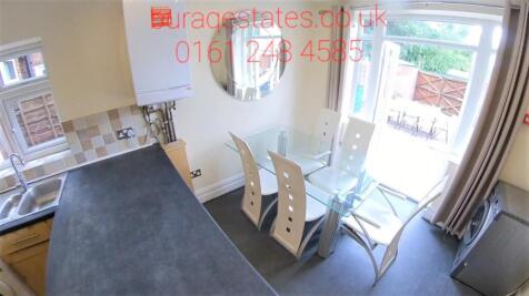 Bright and modern kitchen featuring a sleek cou...