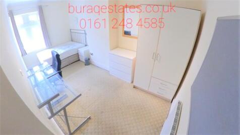 Bright and clean small room featuring a wardrob...