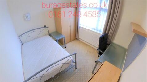 Bright and tidy single bedroom featuring a meta...