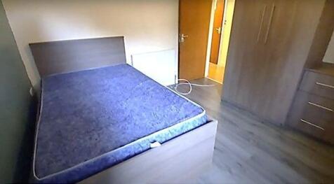 A small, simple bathroom with minimal visible f...