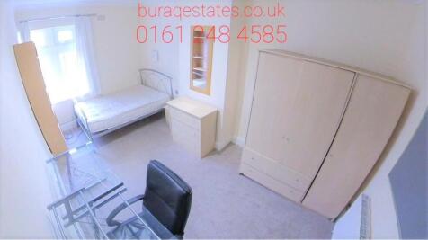 Bright and welcoming living room with ample nat...