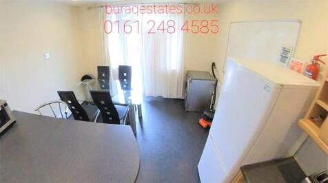 Bright and functional kitchen area with ample n...