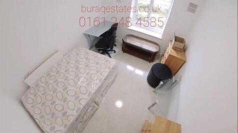 A clean and compact bathroom with a WC, featuri...