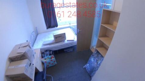 Compact and tidy small room featuring a simple ...