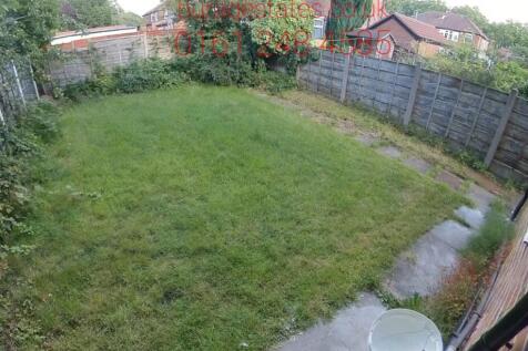 A well-maintained and inviting garden area with...
