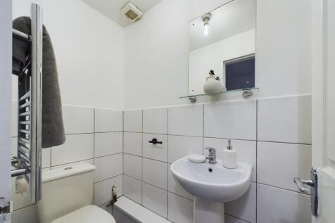 A clean and well-maintained bathroom with a toi...