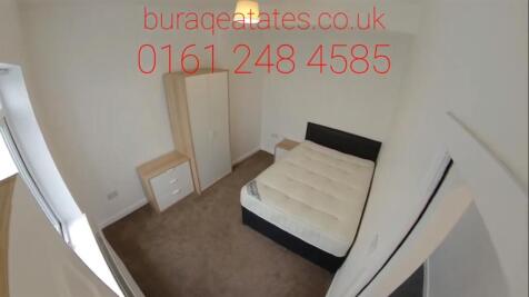 Bright, simply furnished double bedroom with ne...