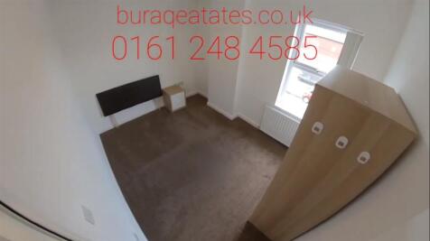 Bright, simply furnished double bedroom with ne...