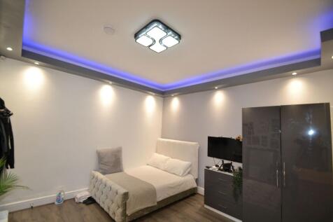 Stylish bedroom with a comfortable double bed, ...