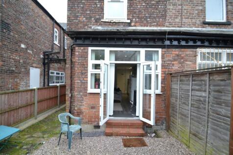 Charming outdoor space with a cozy garden area,...