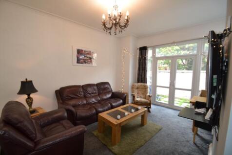 Bright and welcoming living room with comfortab...