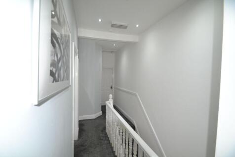 Bright, freshly painted upper landing and stair...