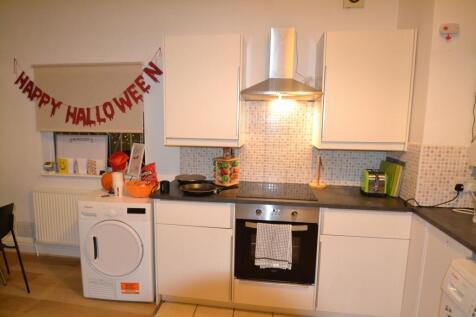 Bright and well-maintained kitchen featuring mo...