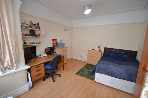 Bright, neatly presented bedroom with a double ...